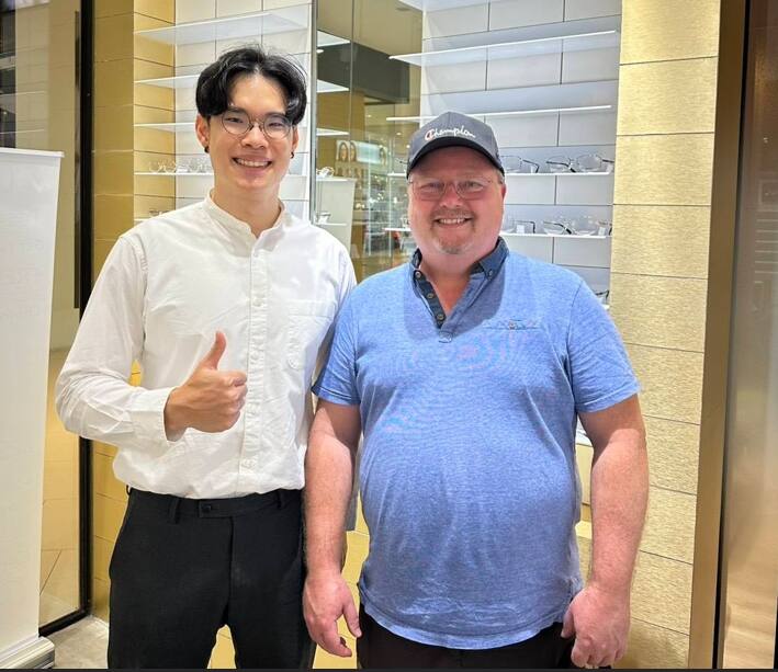 Happy customer with new varifocal glasses at Optical X Riverside Plaza