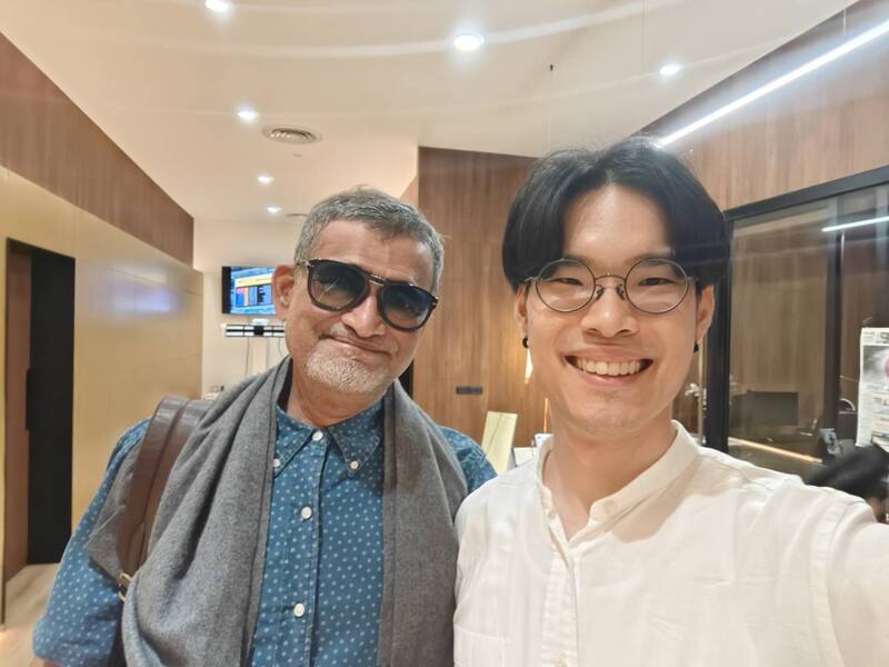 Tourists buying glasses near Anantara Riverside Bangkok at Optical X